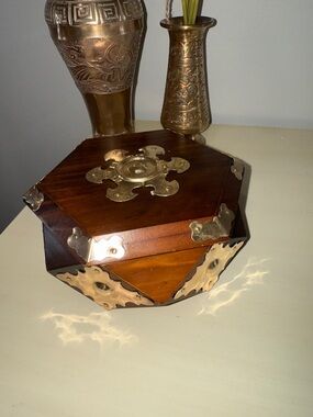 Vintage Indian jewel box - pyramid-shaped hinged lid and brass ornaments.